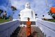 Sri Lanka: Young monk at the Bahirawakanda Buddha that overlooks Kandy